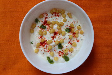 Boondi raita is a Indian raita made with spiced yogurt and boondi (crisp fried gram flour balls), Indian traditional food