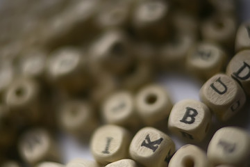 cubes beads letters alphabet / background of wooden cubes with alphabet letters, concept education...