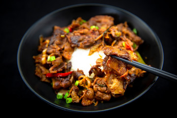 Stir fried with pork and vegetables sprinkle sesame seeds