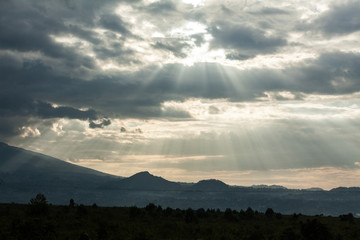 Sun over volcanoes in eastern Congo