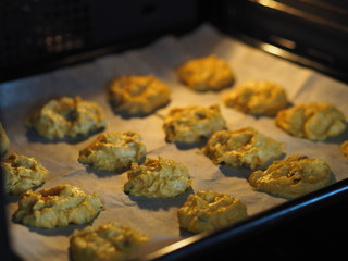 Home cooking. Raw pumpkin cookies with raisins added before baking in the oven.