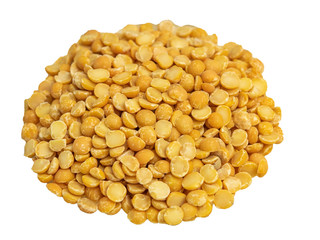 Dry peas in a glass plate on a wooden background