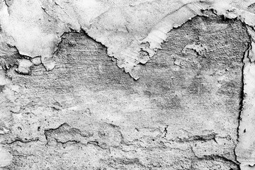 Texture of a concrete wall with cracks and scratches which can be used as a background