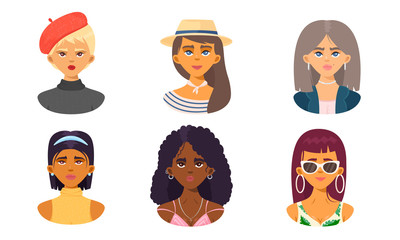 Set of cute girls faces of different nationalities. Vector illustration in flat cartoon style.