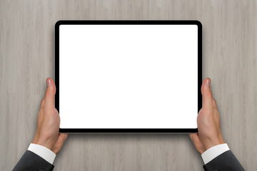 Digital tablet in hands.