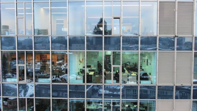 Street reflection on glass steel building facade