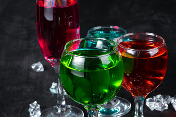 Beautiful alciohol cocktail on dark stone table