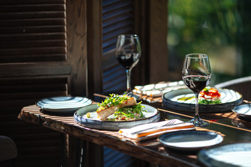 Restaurant dinner, served table, wine