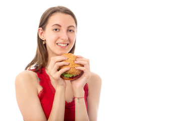 girl eats hamburger