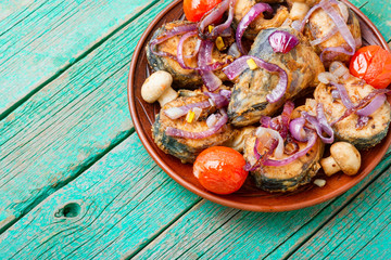 Fried mackerel with vegetables