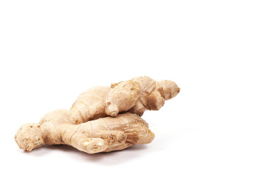 Ginger root isolated on a white background. Seasoning in the kitchen. Side view.