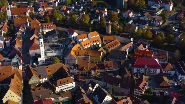 Aerial view of the city Isny im Allgäu in Germany on a sunny afternoon in autumn. Above the old town.