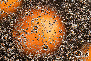 Underwater air bubbles in the black-and-orange. 