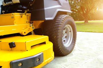 Lawn mower park by the house, zero turn Lawn mower. 