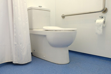 Interior of bathroom for the disabled or elderly people. Handrail for disabled and elderly people in the bathroom