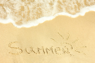 holiday inscription on the beach