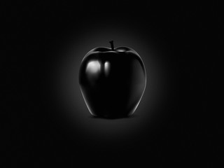 Black apple on a black texture background