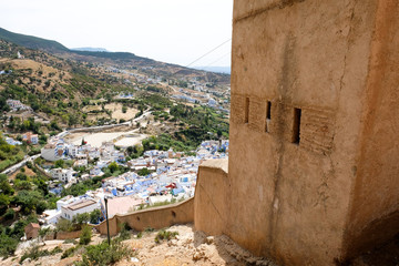 Fototapeta na wymiar Aerial view of blue city of Morocco - Chefchaouen from the fortress wall.