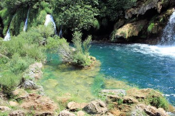 Naklejka premium lovely spot with waterfall on the Krupa river, Croatia