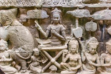 SIEM REAP, CAMBODIA Elephant Terrace detail, temples at Angkor Thom, Cambodia in Angkor Wat complex. Carvings on the wall of the Elephant terrace.