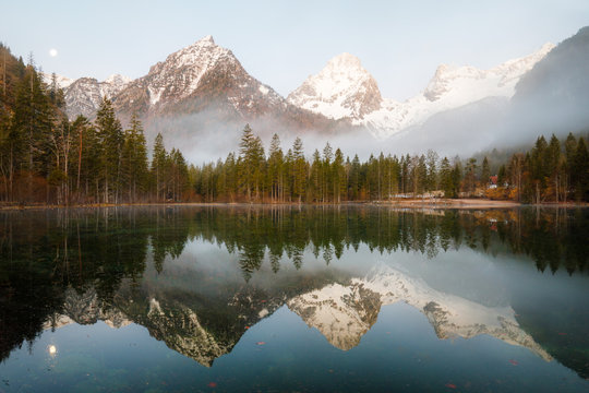 Morning fog over scenery lake at schiederweiher in upper austria