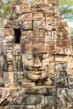 Buddha head on towers of Bayon temple in Angkor Thom, Cambodia