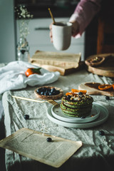 Nettle or spinach pancakes breakfast table