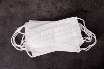 Face masks on dark background