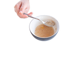 Traditional Turkish dessert ashure or Noah's Pudding isolated on white.