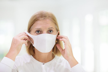 Senior woman in face mask. Virus outbreak.