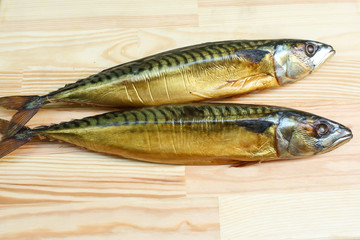  salted, smoked and dried fish, beer snacks, tasty fish on a wooden board