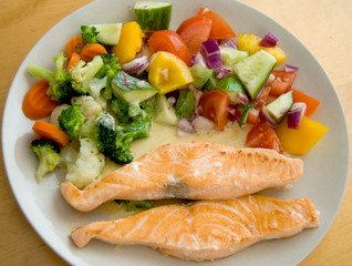 Fried salmon on  plate with vagetables