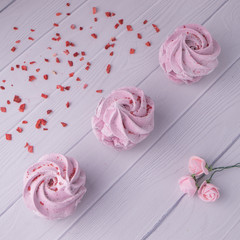 pink marshmallows with rose petals on a general plan