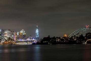 Sydney in Australia, taking pictures of the skyline with the Opera house during a cloudy but warm day in summer at night.