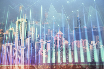 Forex chart on cityscape with skyscrapers wallpaper double exposure. Financial research concept.