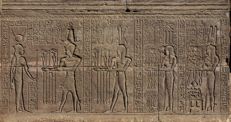 Hieroglyphic egypt carvings on wall