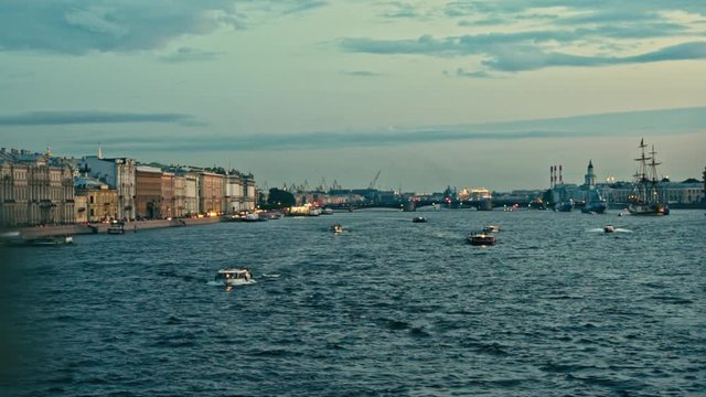 View of the picturesque Neva River from the Trinity Bridge in St Petersburg, Russia on a fine summer's day. 
