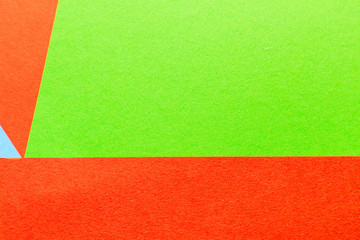 Blue, red and green color paper texture background.