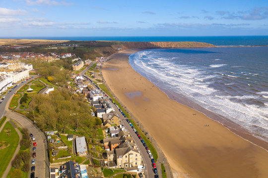 Aerial photo of the British seaside town of Filey, the seaside coastal town is located in East Yorkshire in the North Sea coast showing the beach and ocean.