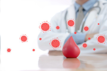 Doctor hands protracted a red blood for anti covid-19
