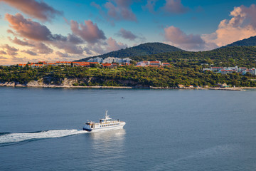 A large ferry moving across the bay in Dubrovnik, Croatia