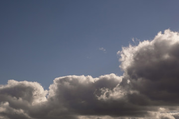 dark Blue sky background with tiny stratus cirrus striped clouds. Clearing evening and Good windy weather