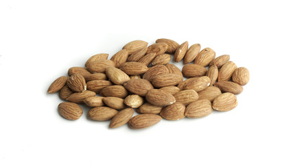 Pile of almond seed isolated on white background