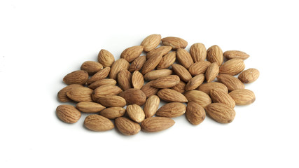 Pile of almond seed isolated on white background