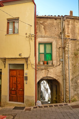 Obraz premium Oliveto Citra, Italy, 04/08/2017. A narrow street between old buildings of a medieval village.