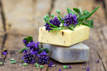 bars of natural soap and lavender flowers