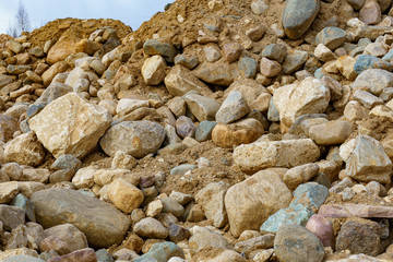 pile of cobblestones with sand