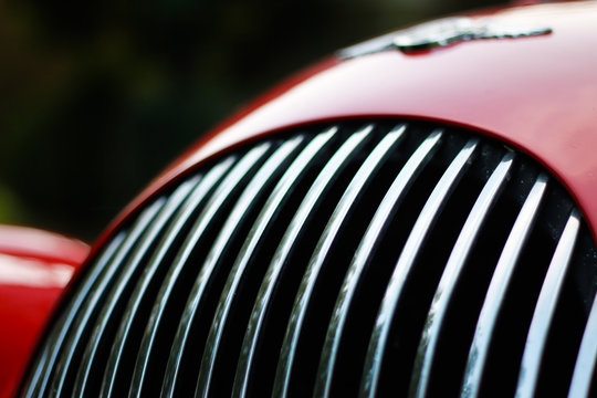 Front grill of a red retro car