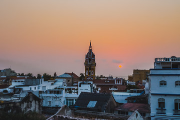 Cityscape skyline of the clocktower of Cartagena de Indias, Colombia, during a beautiful sunset