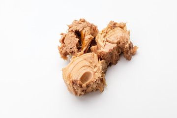 Canned tuna on white background